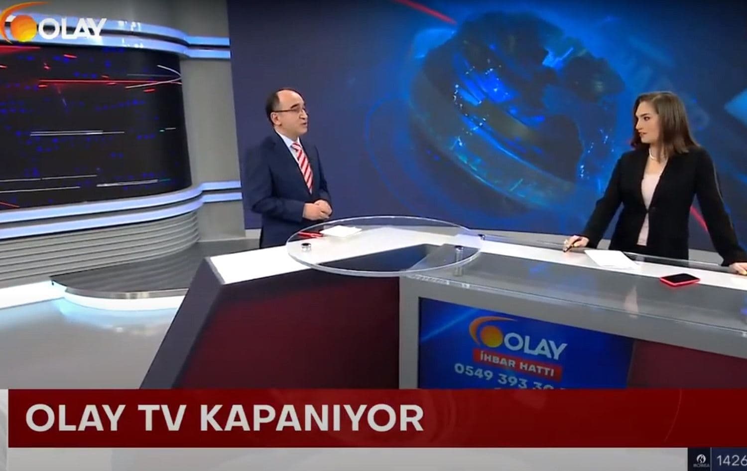 Suleyman Sarilar, executive editor of Olay TV, speaks on air on December 25, 2020. Photo: screengrab/Olay TV 