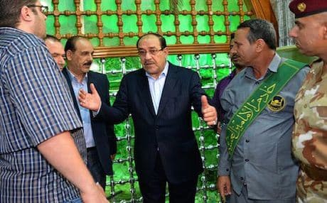 Maliki (center) on a visit to Samarra. Photo: AFP