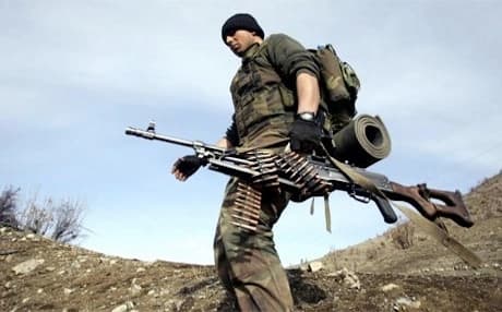 A Turkish soldier patrols the border with the Kurdistan Region near Sirnak. Photo: AFP