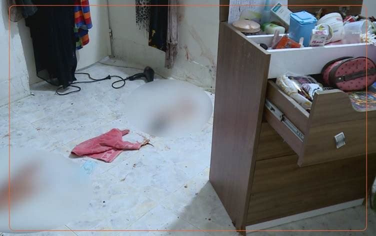 The aftermath of the murder at the victim's mother's house. Photo: Rudaw