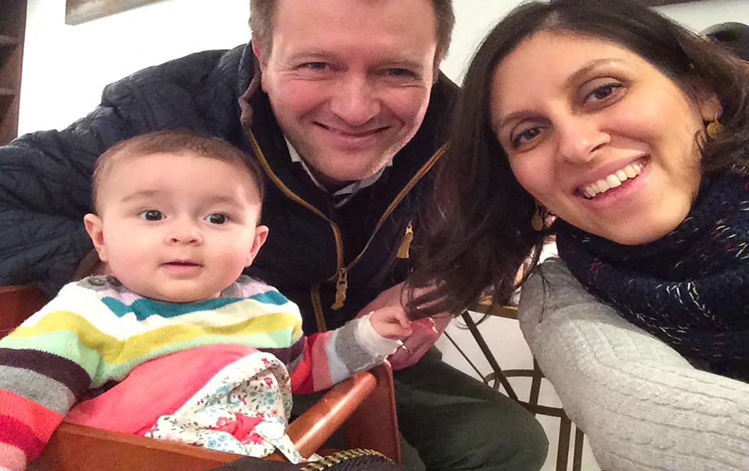 This undated file handout image released by the Free Nazanin campaign in London on June 10, 2016 shows Nazanin Zaghari-Ratcliffe posing for a photograph with her husband Richard and daughter Gabriella. Photo: Free Nazanin campaign / AFP