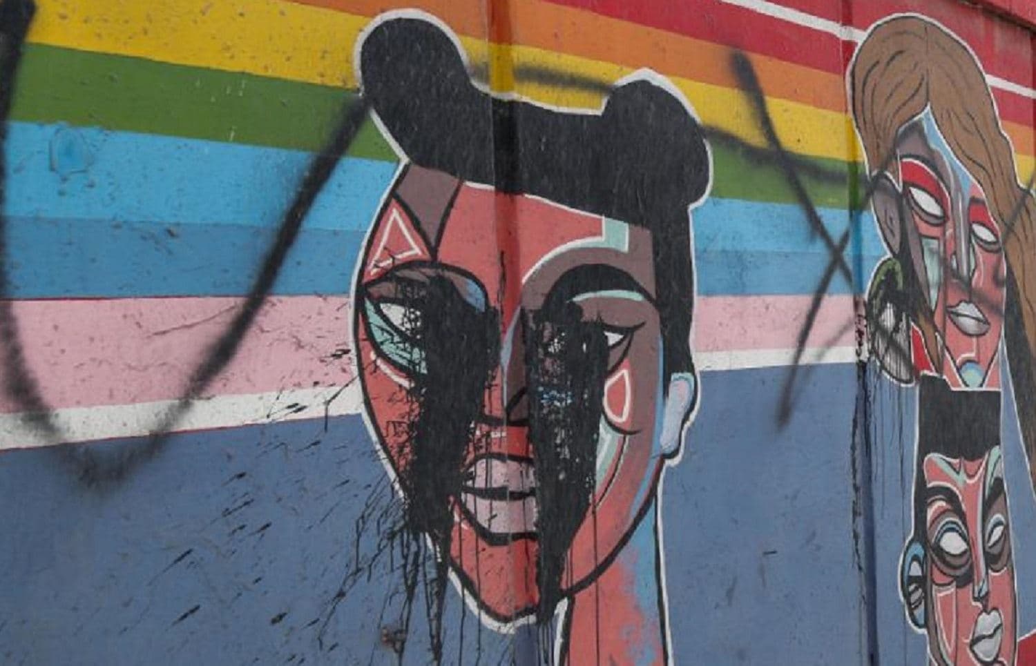 Murals near the American University of Iraq, Sulaimani on May 2, 2021. The murals, painted to encourage coexistence, have been defaced multiple times. Photo: Hama Sur