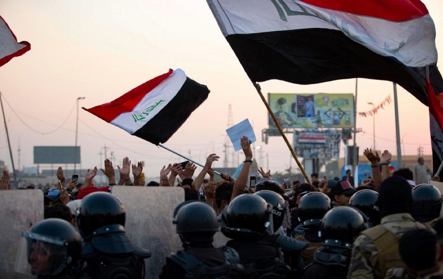 Iraqi anti-government protestors confront security forces in the southern city of Basra, on October 31. File photo: AFP