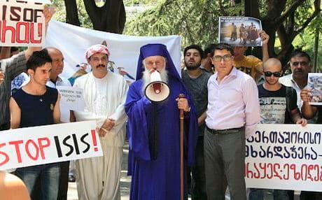 “We stand here, today, in front of the UN office in Tbilisi, to send a message to the world to stand with us. We are delivering a letter to UN Secretary-General (Ban Ki-moon) asking to make every effort to stop the persecution of Yezidis and Christians,” Mirzoev said. Photo by author
