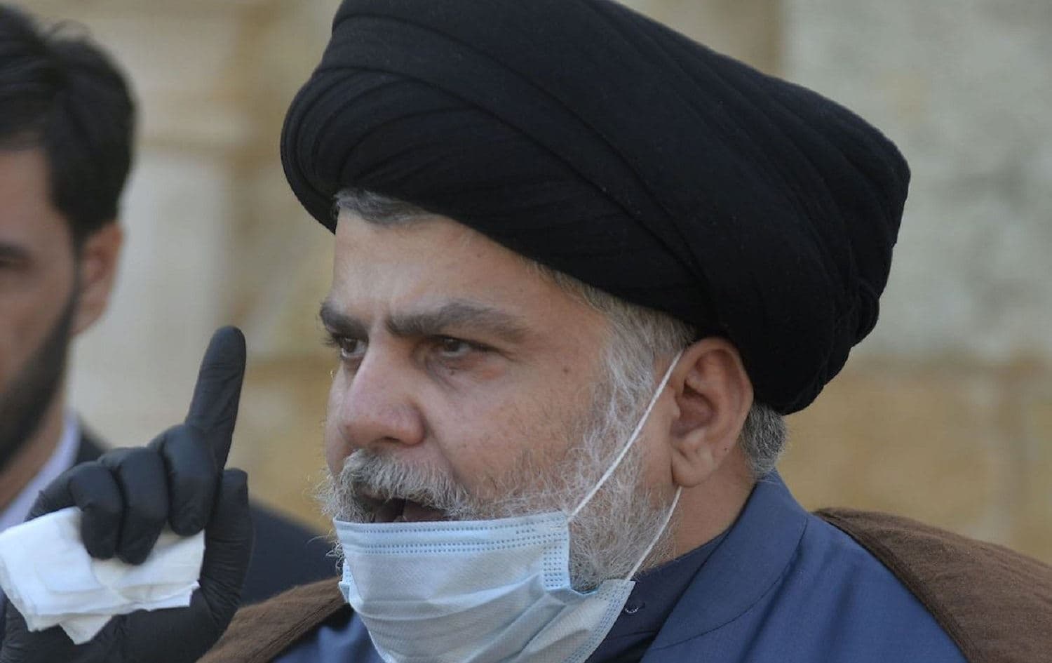 Iraqi cleric Muqtada Sadr delivers a statement in which he backed early elections overseen by the United Nations in Najaf, on 10 February 2021. Photo: AFP via Getty Images/ Ali Najafi 