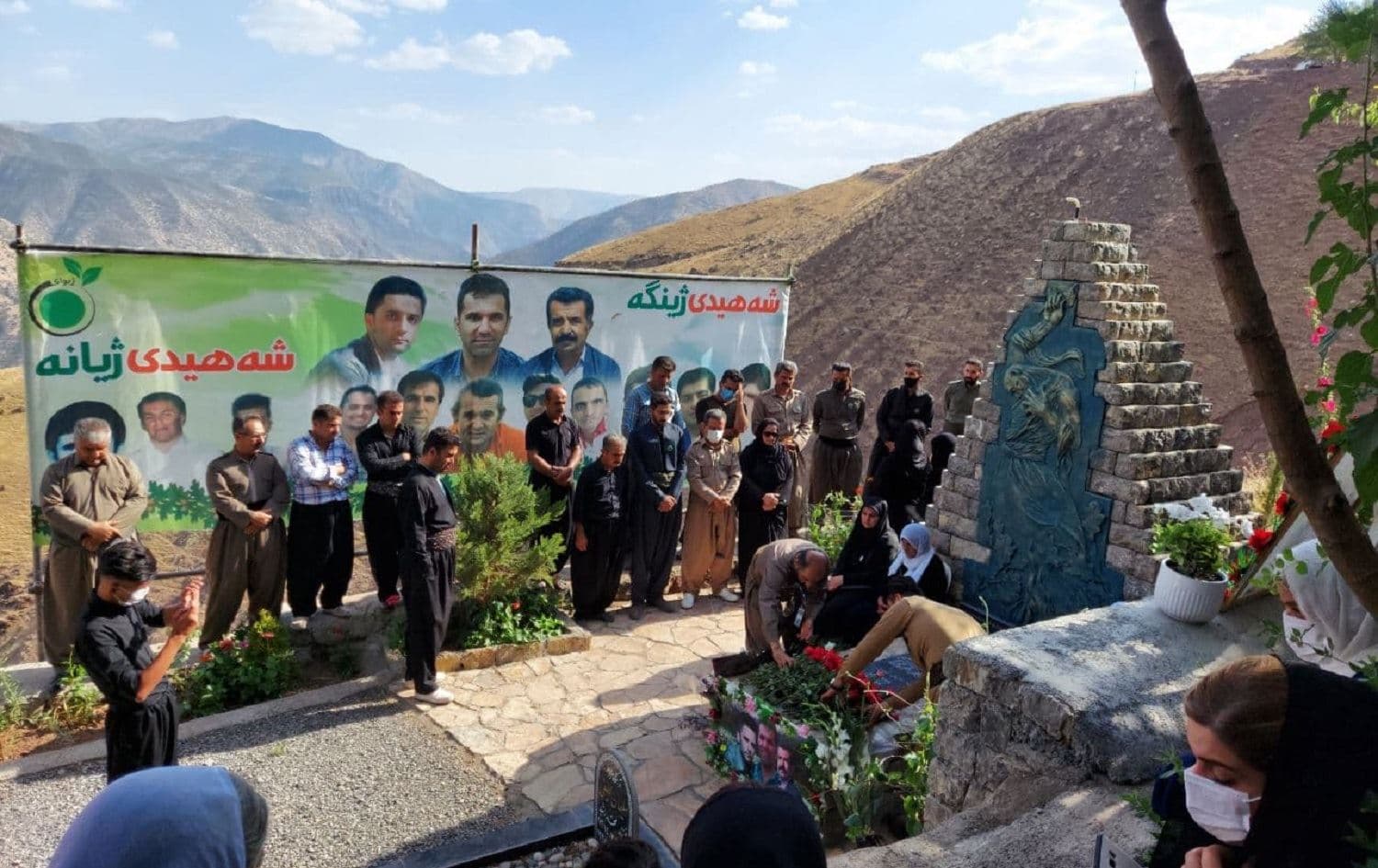 Environmentalists in Nowsud, Iran on June 29, 2021 mourn Mukhtar Kandani, Bilal Amini, and Yasin Karimi who were killed a year ago, battling wildfires in Paveh. Photo: Jabar Dastbaz/Rudaw
