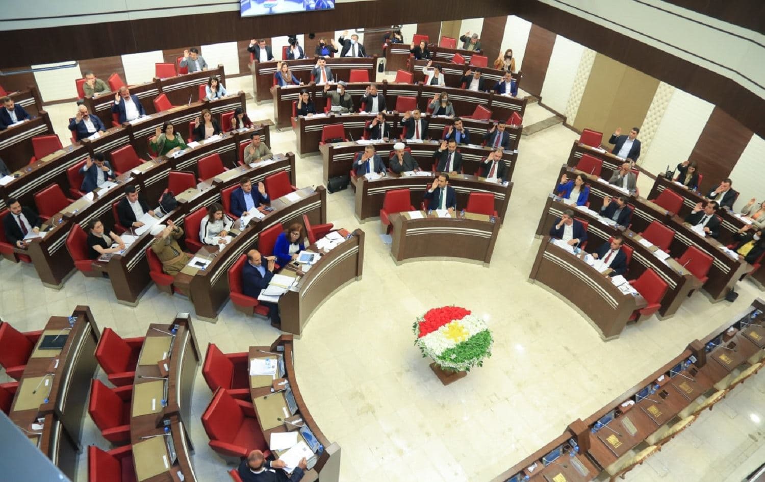 Lawmakers vote on a motion in the Kurdistan parliament. Photo: handout/Kurdistan parliament