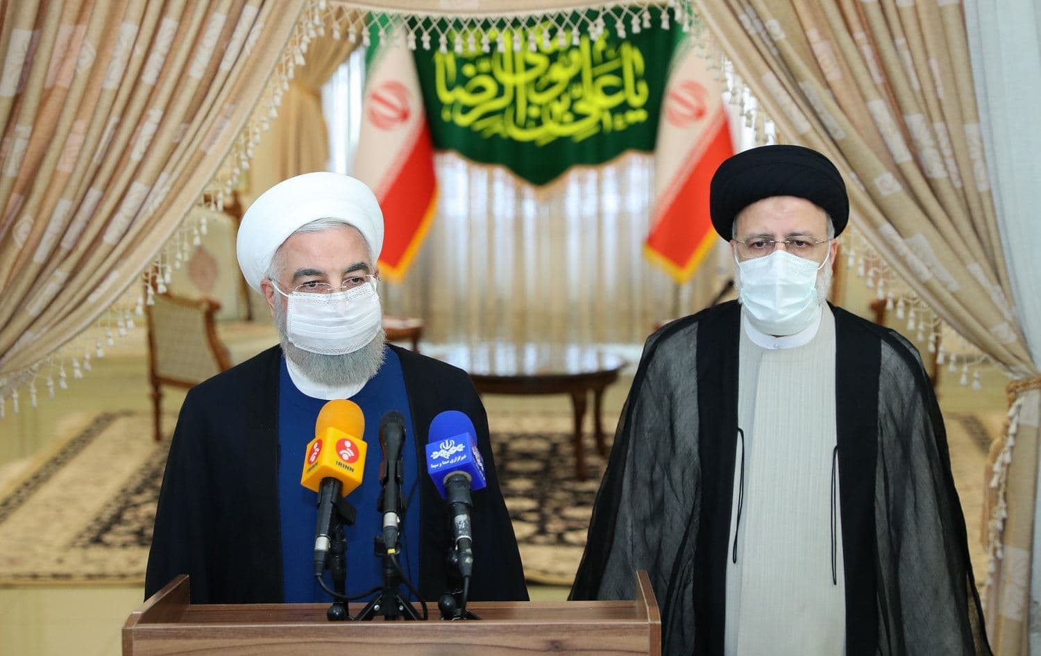 Iranian President Hassan Rouhani (left) met with his successor Ebrahim Raisi (right) on June 19, 2021. Photo: handout/Iran presidency