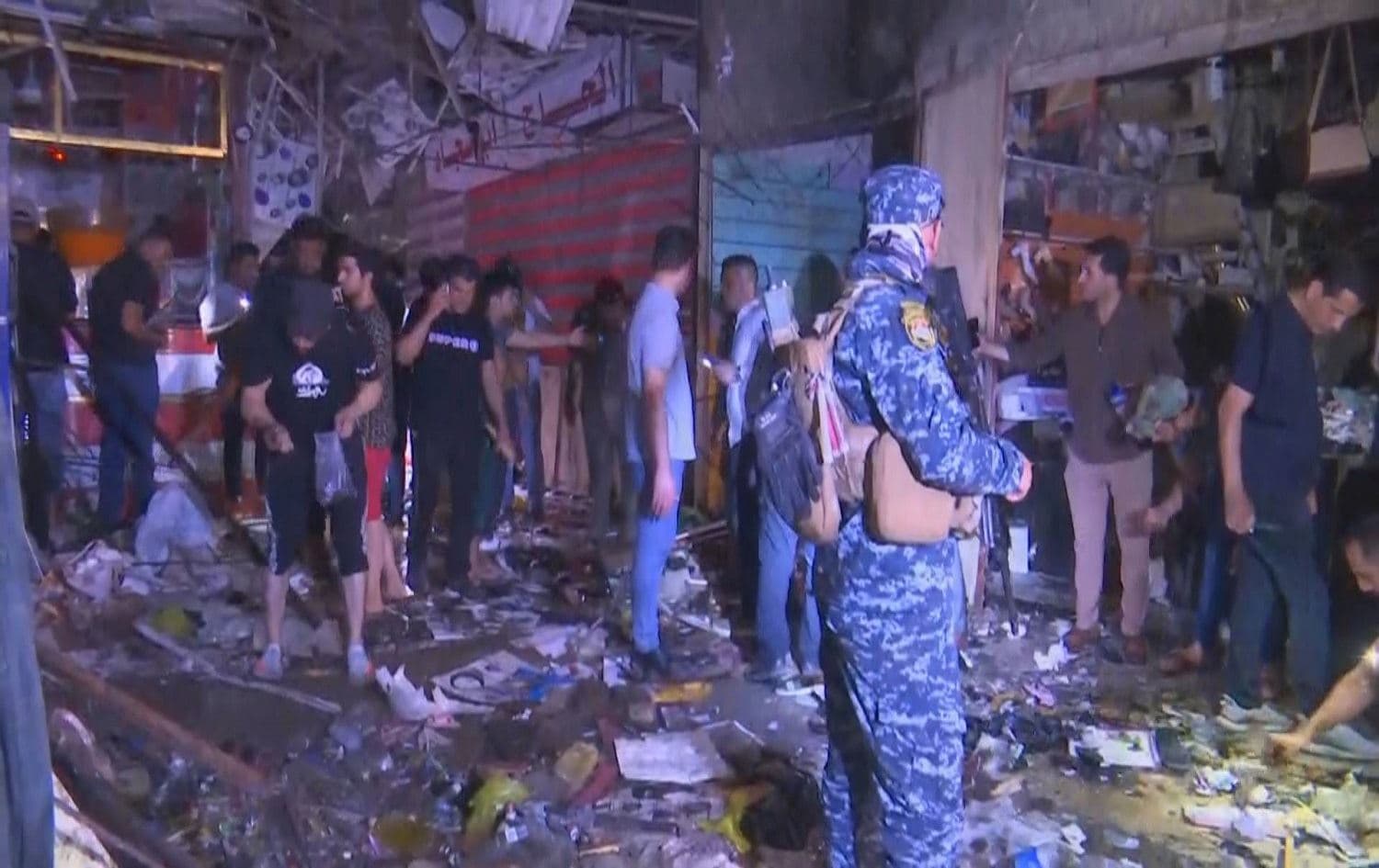 The aftermath of the explosion at Sadr City's al-Wahilat market. Photo via AP live feed