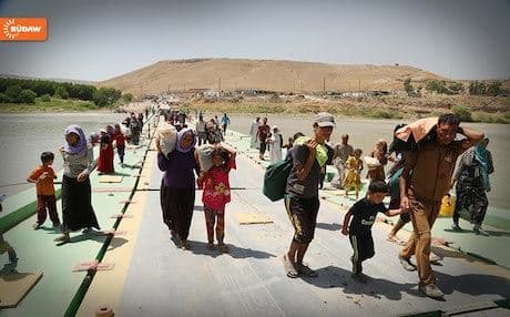 Yezidi families reaching Kurdistan Region.