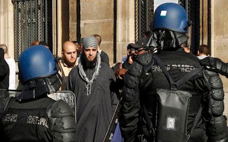 French police keep a close watch on a protest by IS supporters in Paris. Photo: AFP