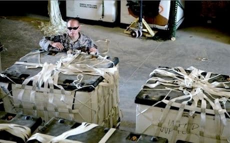 An American soldier with aid for Iraq. Photo: US Mission/NATO