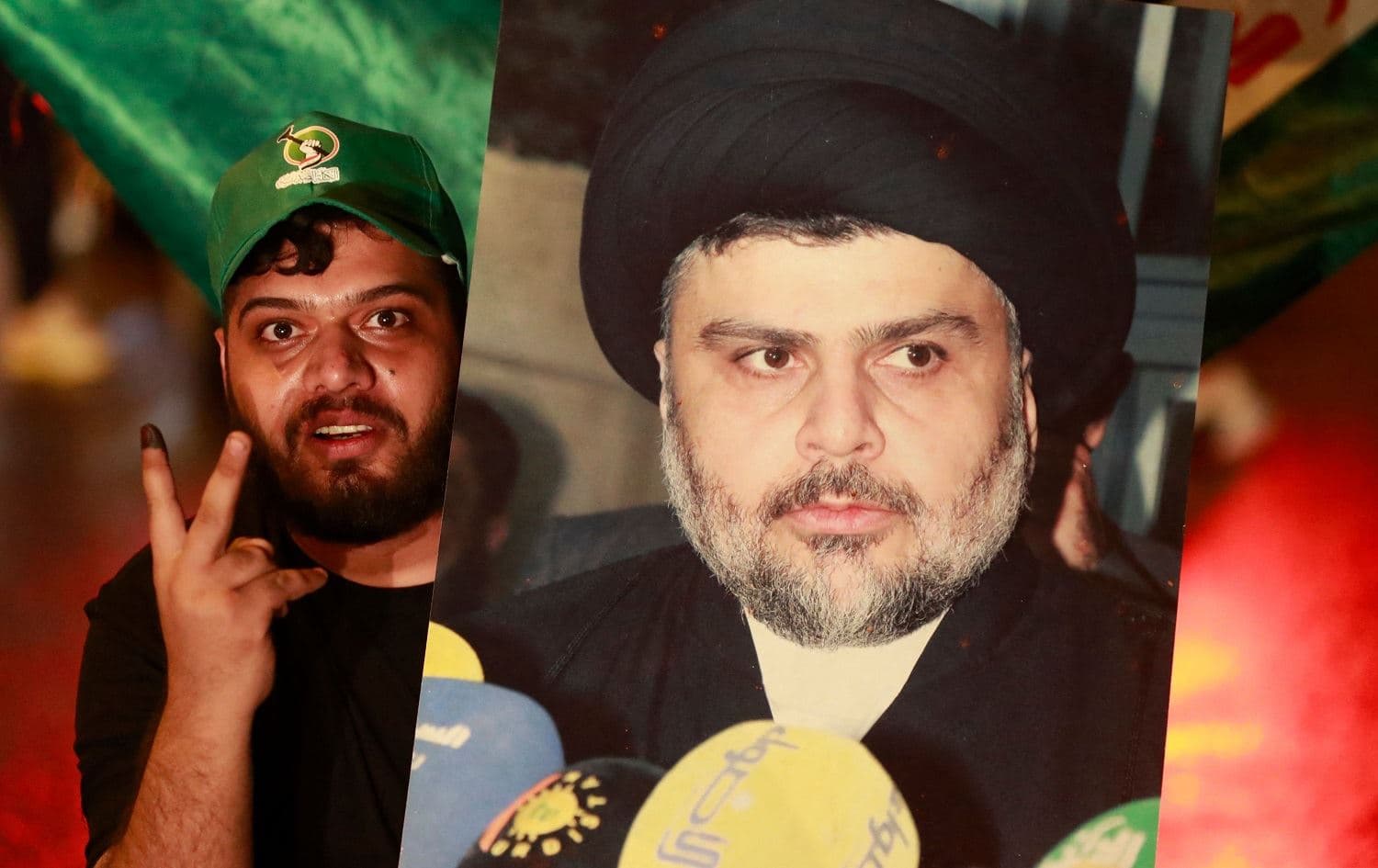 Supporters of Iraqi Shiite cleric Moqtada al-Sadr celebrate in Baghdad's Tahrir square on October 11, 2021. Photo: Ahmad al-Rubaye/AFP