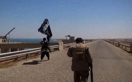 A video grab from several days ago allegedly showing Islamic State fighters on the grounds of Mosul dam. Photo: AFP