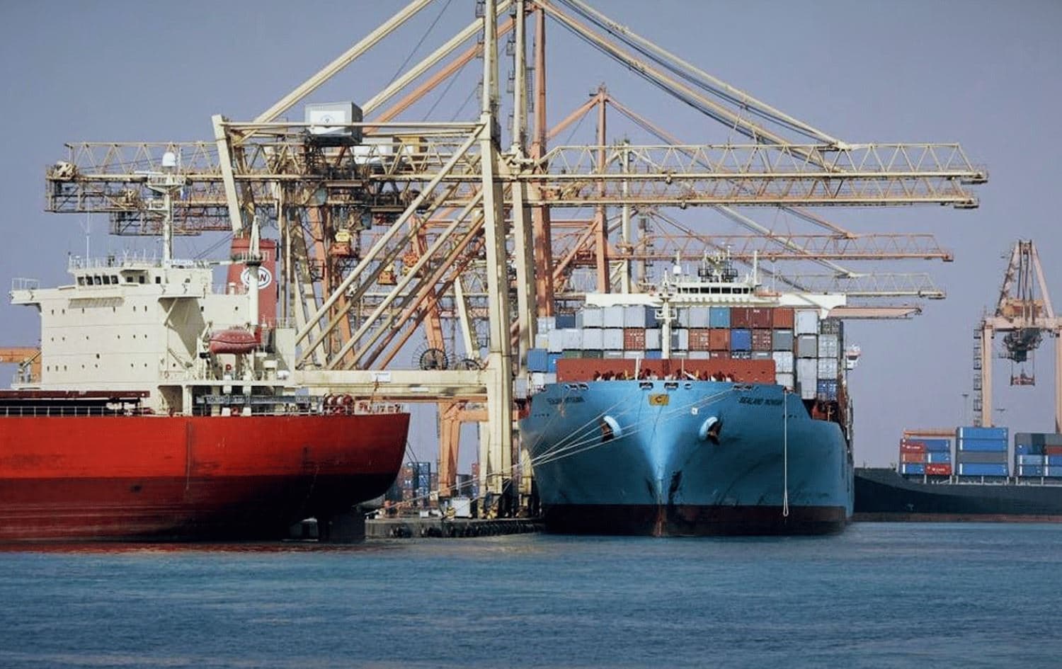 Cranes unload containers from the deck of ships in the Jeddah Islamic Port. Photo: AFP