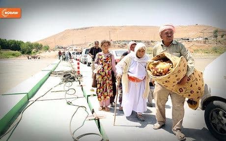 Yezidi families fleeing the Islamic State armies in search of shelter.