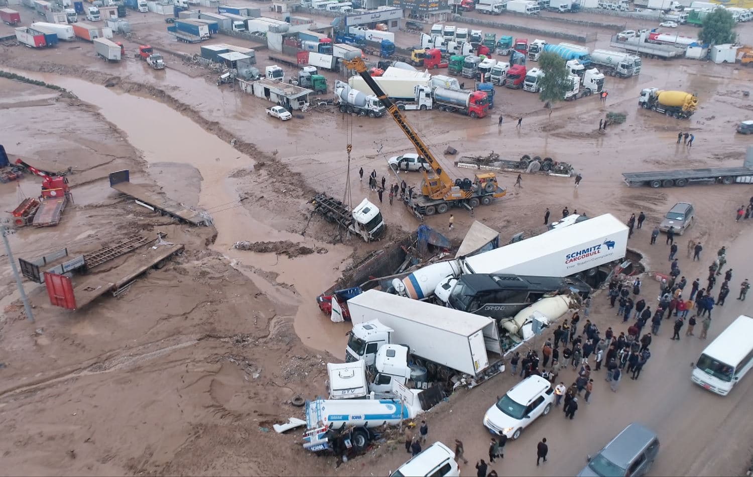 The southeastern neighborhoods of Erbil suffered severe flash flooding on Friday. Photo: Rudaw/screenshot. December 17, 2021.  