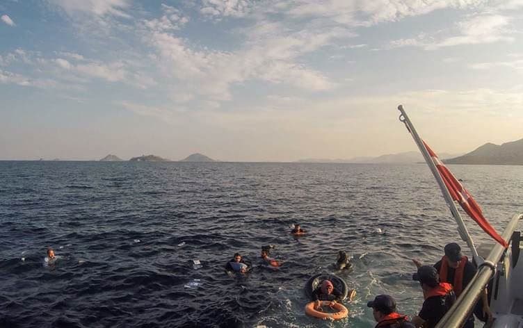 Migrants being rescued after their boat sank in the Aegean Sea, off the coast of southwestern Turkey on June 17, 2019. File photo: AFP 