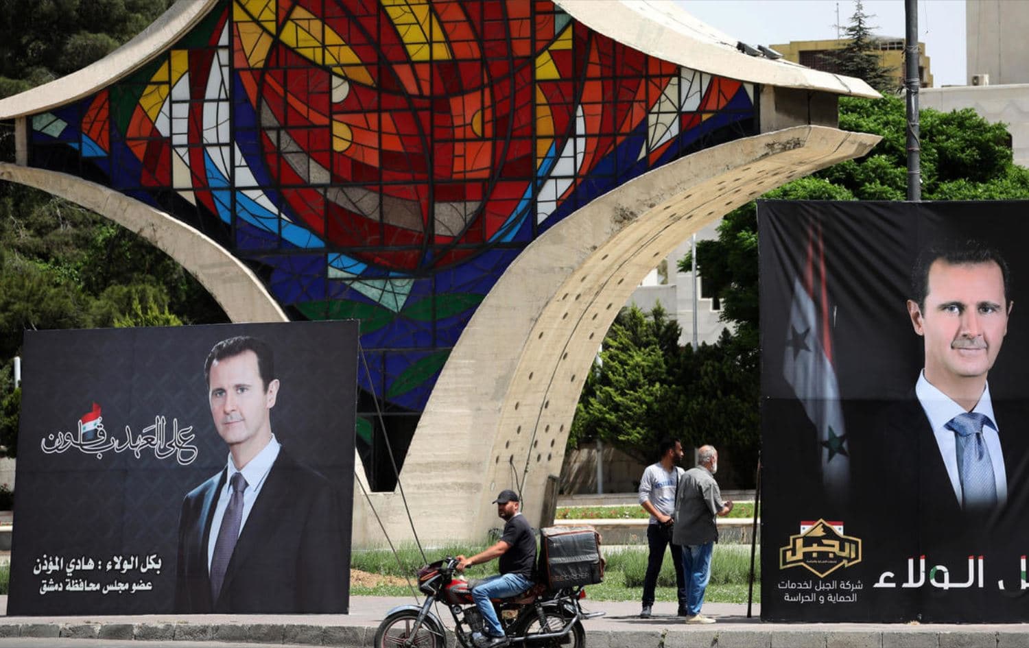 Billboards depicting Syrian President Bashar al-Assad in Damascus. Date: May 3, 2021. Photo: AFP 