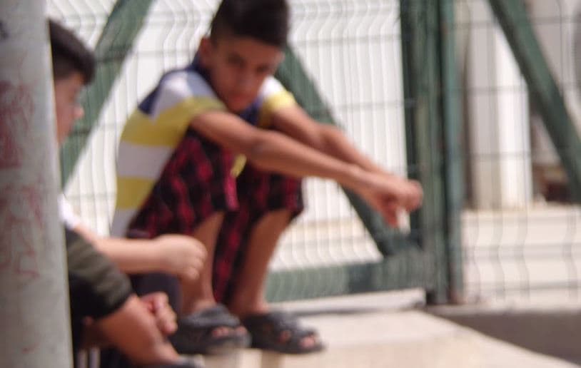 Children captured in the hot haze of Kabartu IDP camp, Kurdistan Region, on September 1, 2021. Photo: Alannah Travers/Rudaw