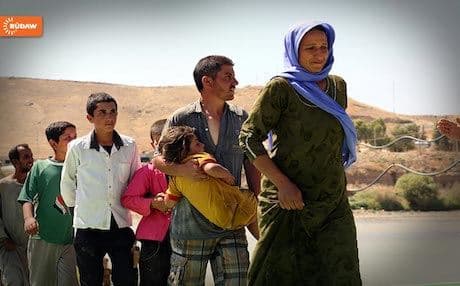 Homeless Yezidis arriving in Kurdistan, escaping from jihadi militants who regard them as ‘unbelievers.’ 