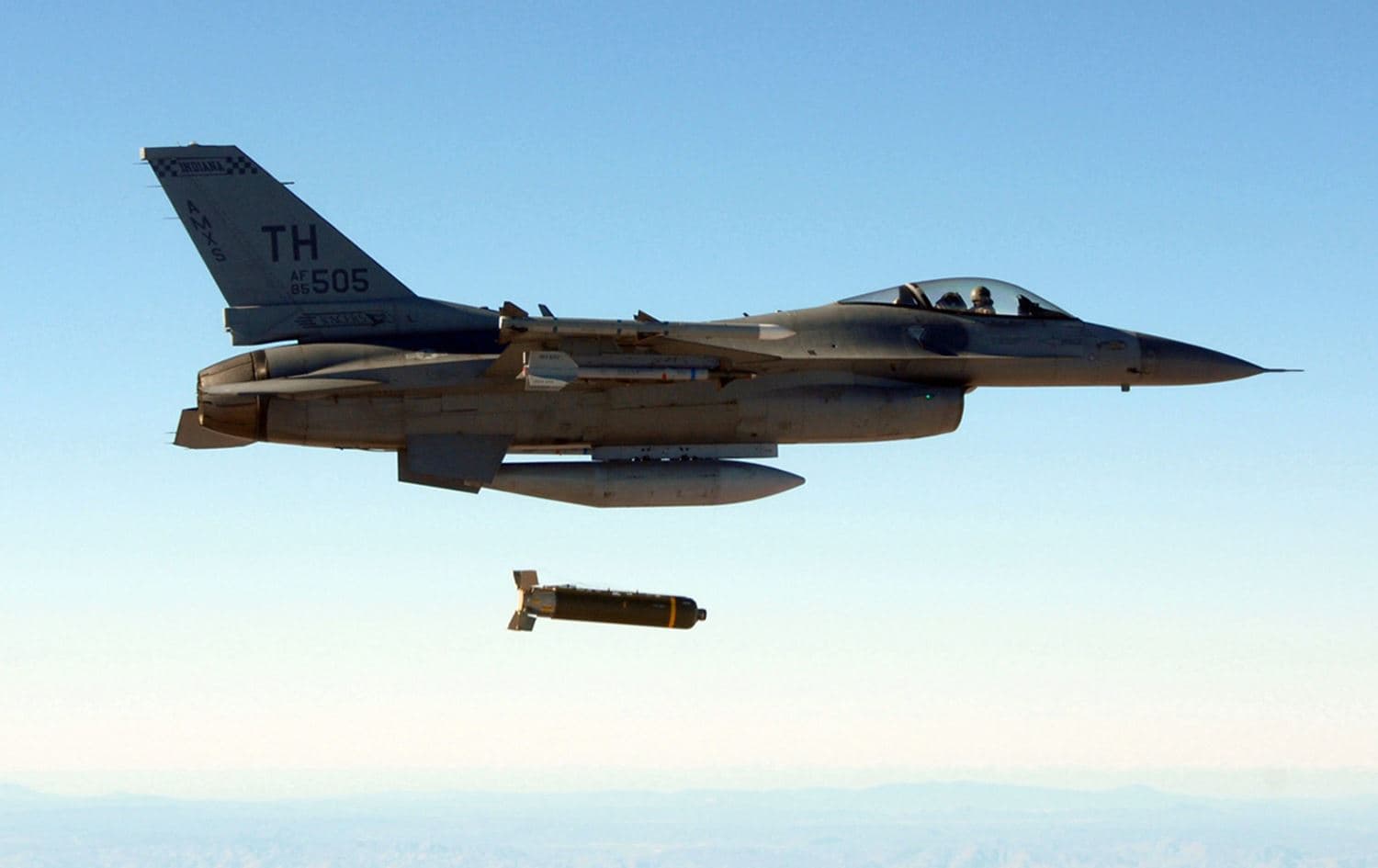 An F-16 fighter aircraft dropping a cluster bomb. File photo: AP