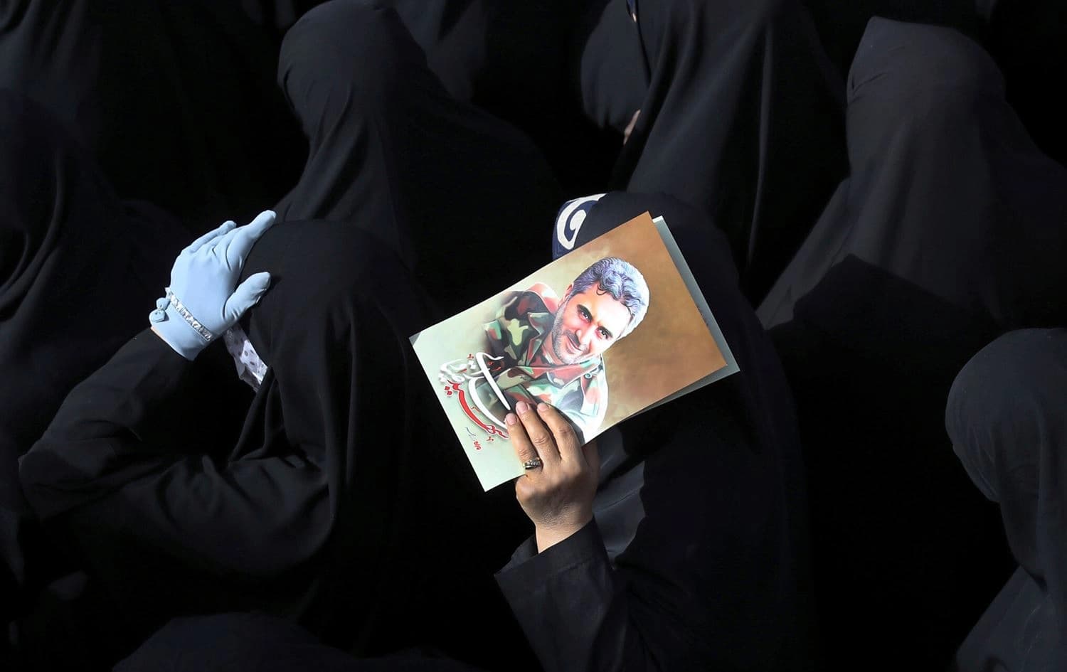 Mourners gather around the coffin of Iran's Revolutionary Guards colonel Sayyad Khodai during a funeral procession at Imam Hussein square in the capital Tehran, on May 24, 2022. Photo: Atta Kenare/AFP