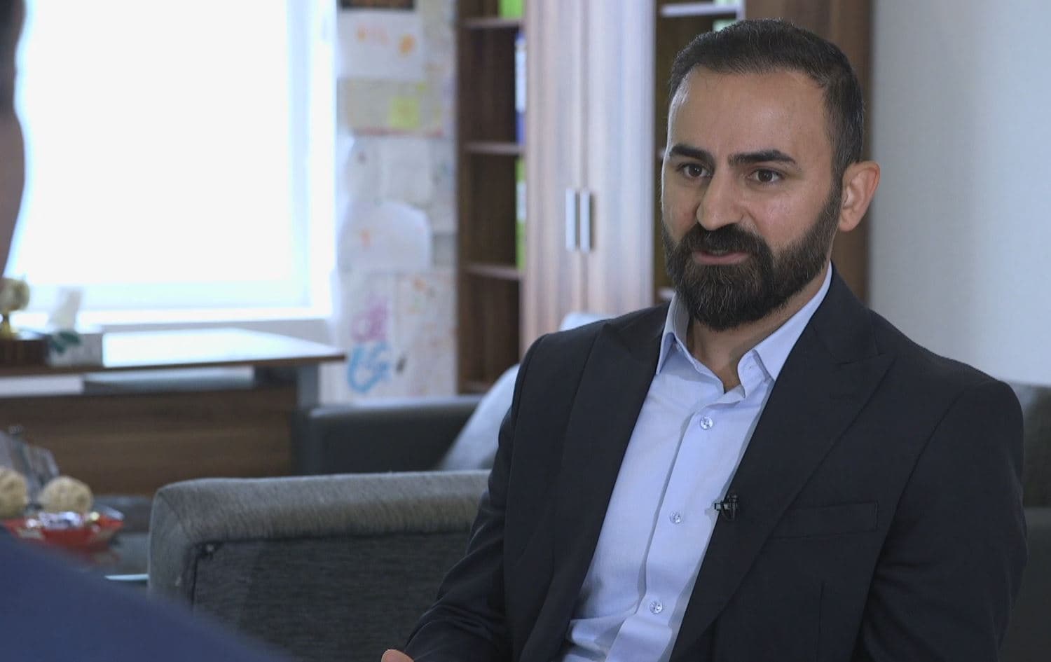 Karwan Akrayi speaking to Rudaw's Hemen Abdulla in Kiel, Germany, on May 24, 2022. Photo: Rudaw