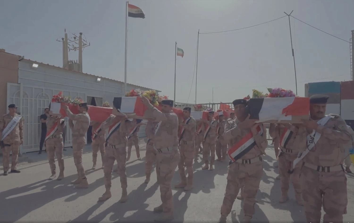Iraqi soldiers retrieving the bodies of their returned soldiers from Iran on June 30, 2022. Photo: ICRC/screenshot
