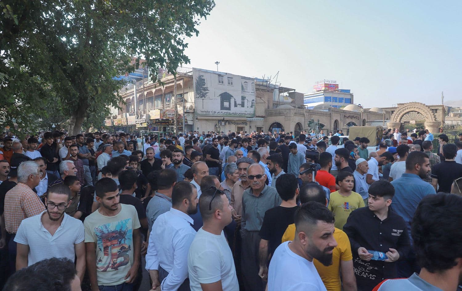 People gather for a rally called for by opposition party New Generation Movement in the city of Sulaimani, Kurdistan Region on August 6, 2022. Photo: Shwan Mohammed/AFP
