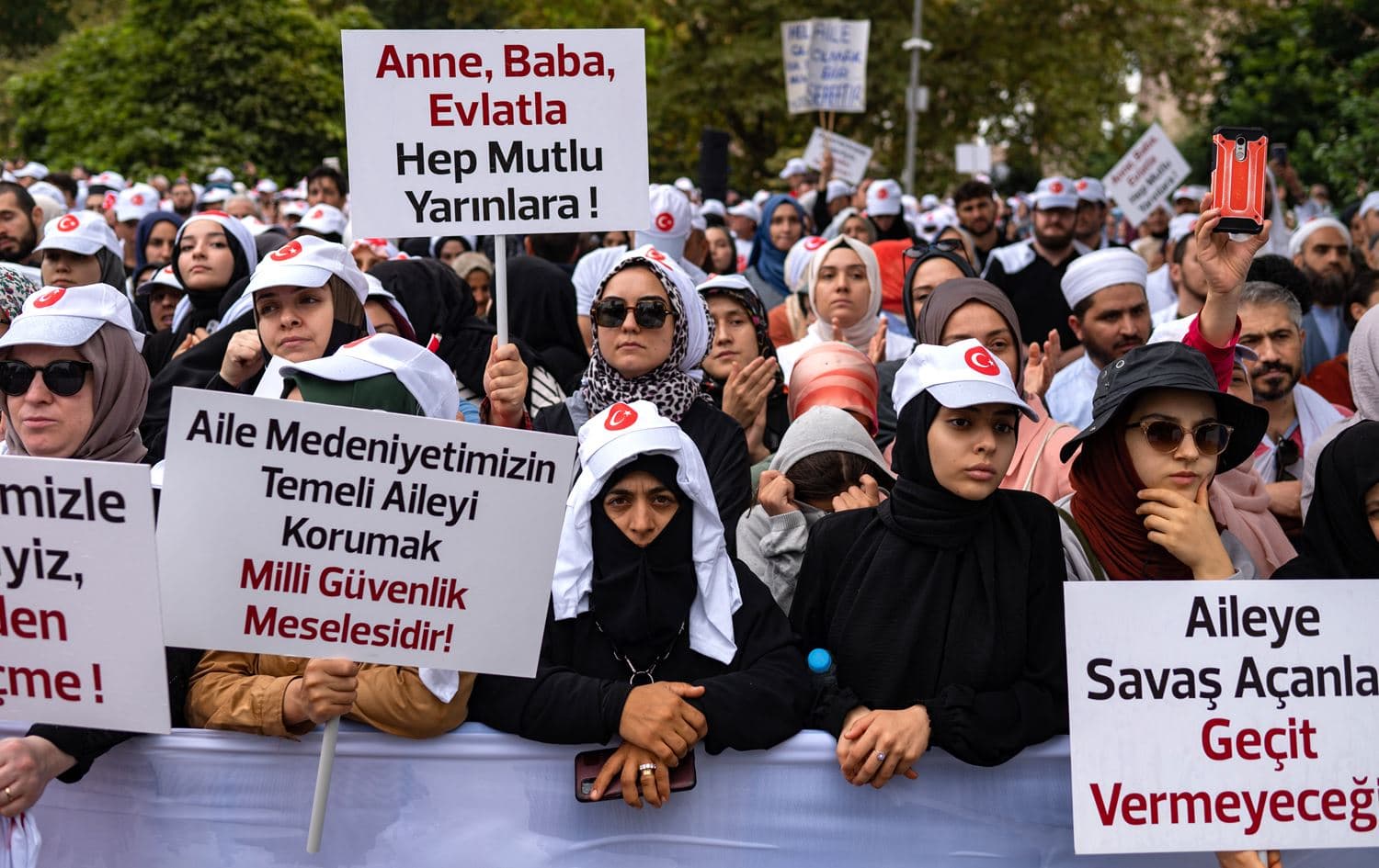 Protesters hold placards during an anti-LGBT rally organised by pro-Islamic organizations in Istanbul on September 18, 2022. Photo: Yasin Akgul/AFP