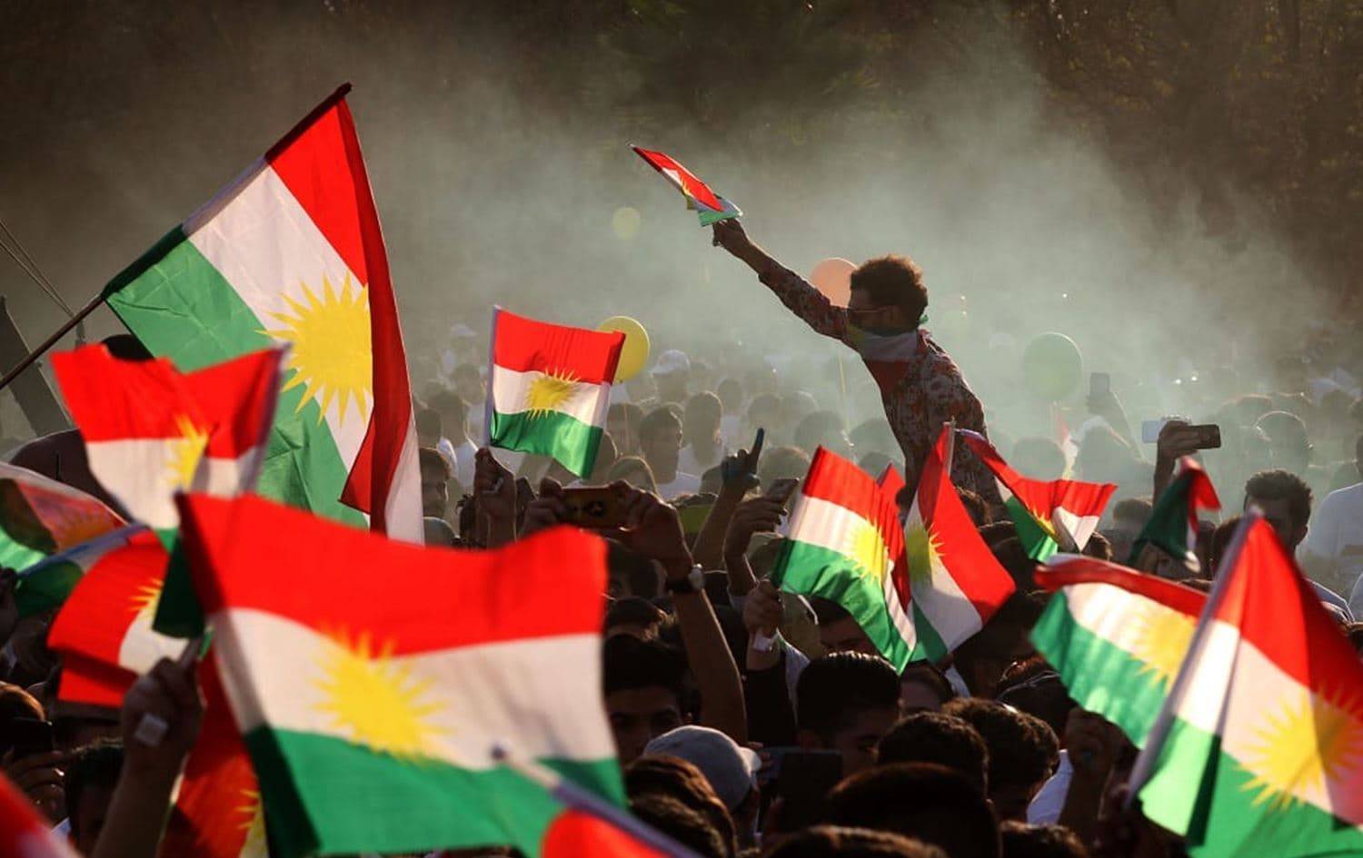Kurds flying the Kurdish flag during an event to urge people to vote in the independence referendum in Erbil, the capital of the Kurdistan Region, on September 15, 2017. Photo: Safin Hamed/AFP