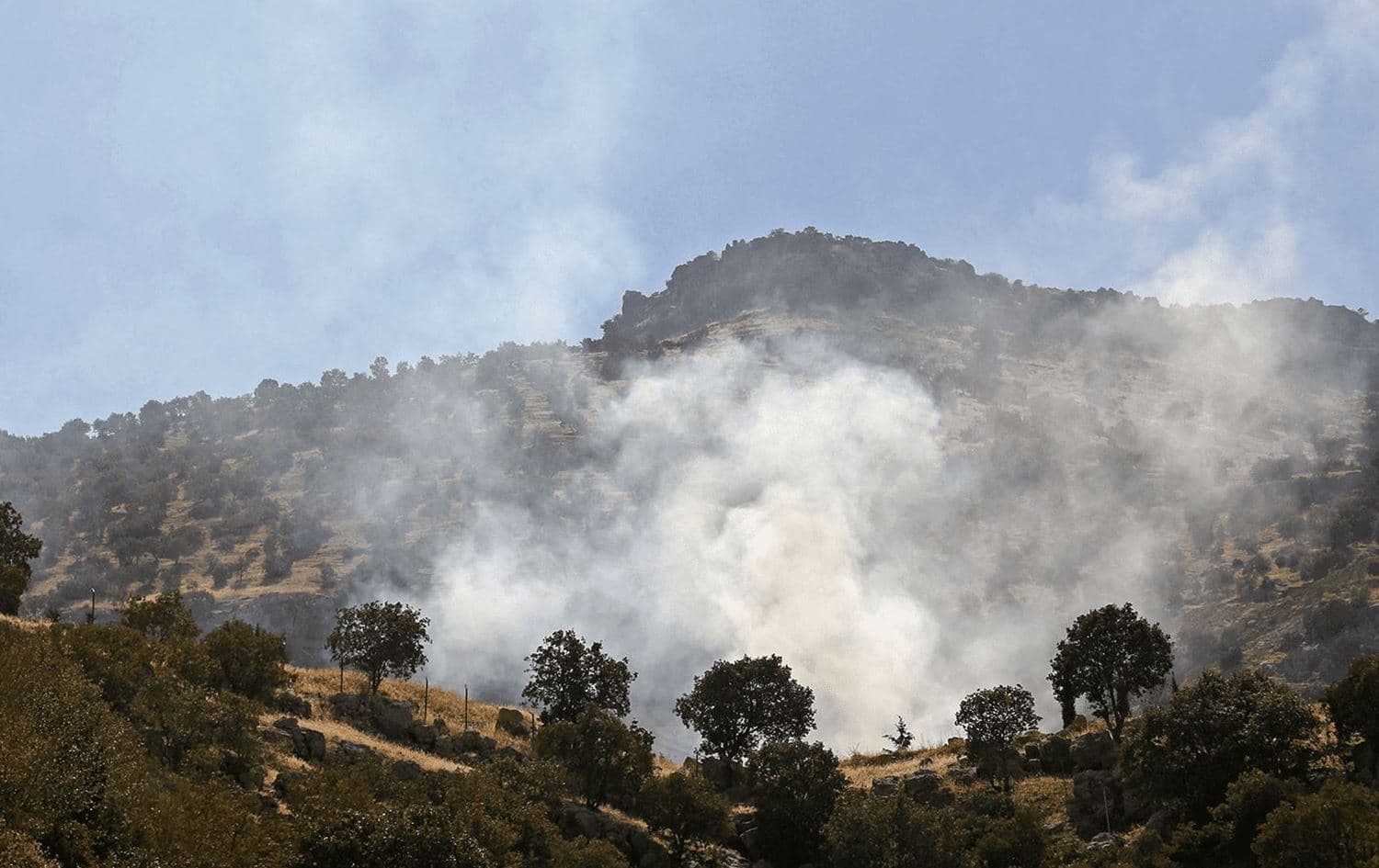Smoke billows following an Iranian cross-border attack in the area of Zargwez, on September 28, 2022. Photo: AFP