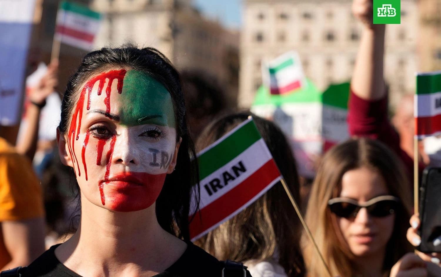 People stage a protest against the death of Zhina (Mahsa) Amini during a rally in central Rome on October 29, 2022. Photo: Gregorio Borgia/AP