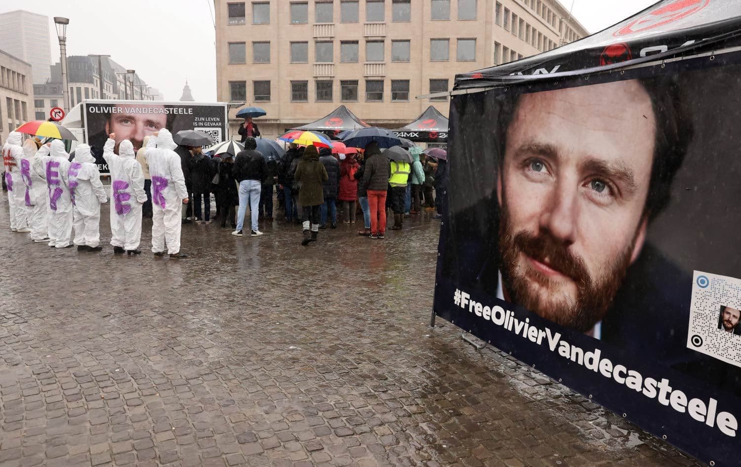 Protesters wear clothes reading ‘Free Olivier’ during a solidarity demonstration with Belgian aid worker Olivier Vandecasteele in Brussels on December 25, 2022. Photo: AFP