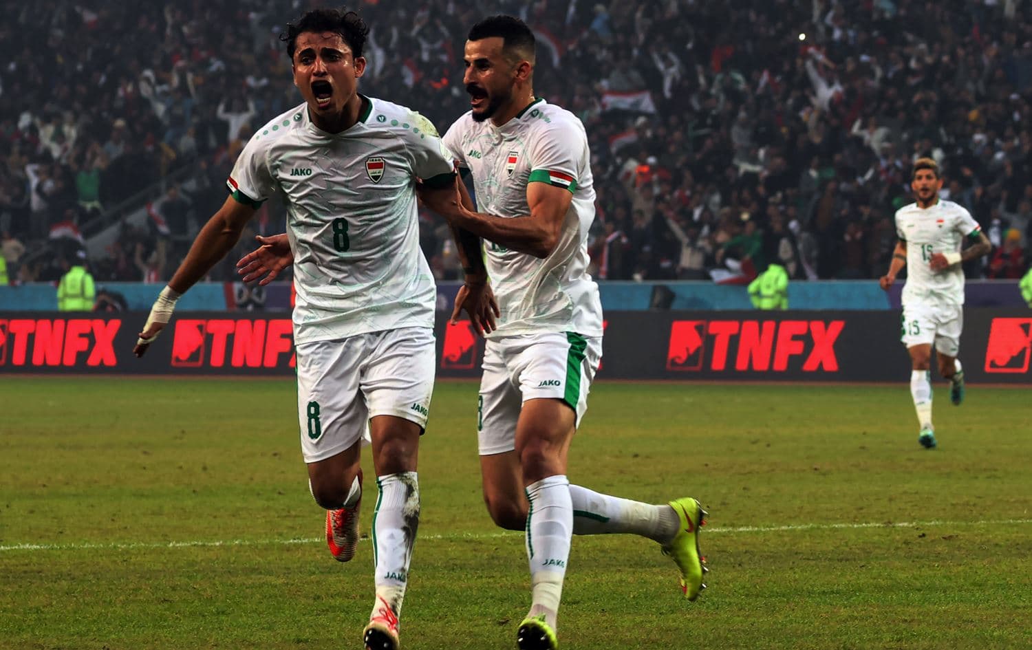 Iraq's midfielder Ibrahim Bayesh celebrates after scoring his team's first goal during the Arabian Gulf Cup semi-final match against Qatar at the Basra International Stadium on January 16, 2023. Photo: Ahmad al-Rubaye/AFP