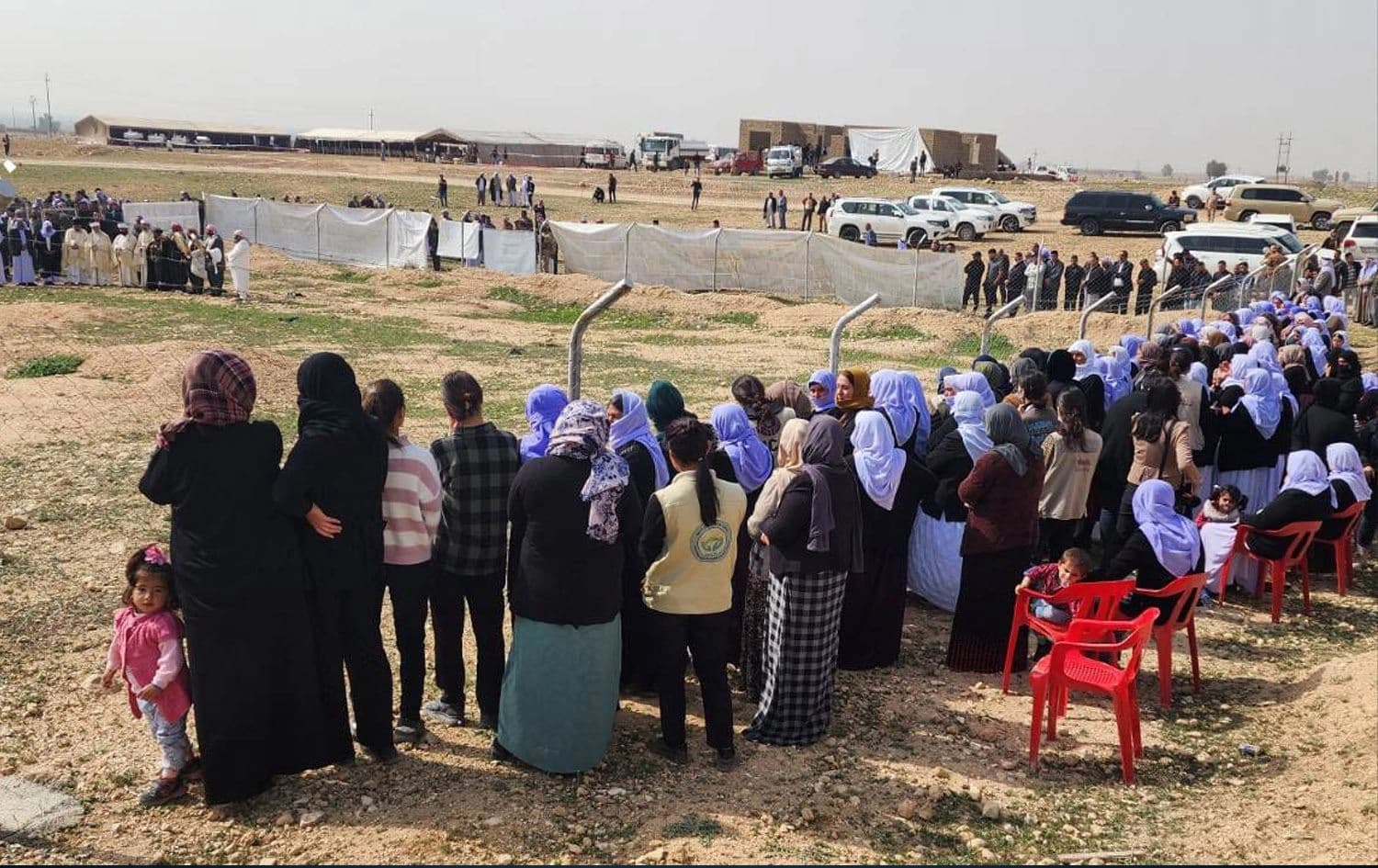 Yazidi families gather at the site of a Yazidi mass grave as exhumation process starts in Hamadan village of Shingal. Photo: Rudaw