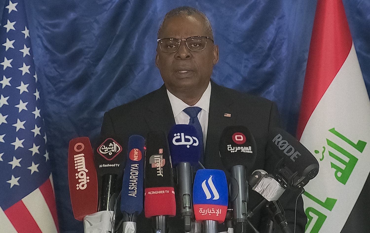 US Defense Secretary Lloyd Austin speaking to reporters following his arrival in Baghdad on March 7, 2023. Photo: Screengrab/AP