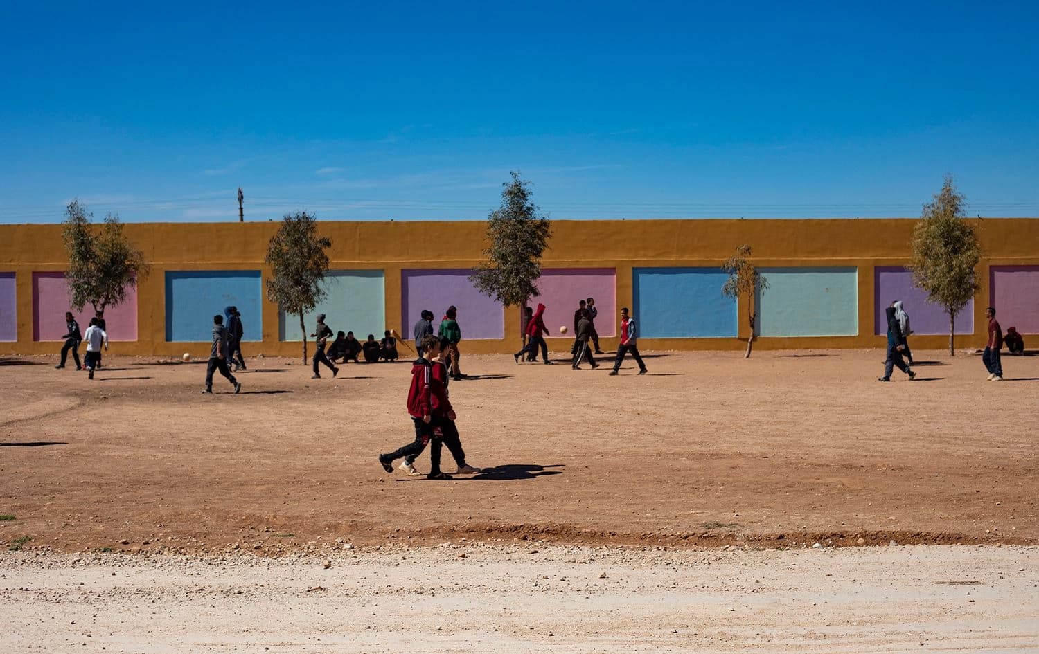 Children of foreign Islamic State (IS) fighters walk in a playground at the Orkesh rehabilitation centre in the countryside of Qamishli in northeastern Syria on March 7, 2023. Photo: Delil Souleiman/AFP