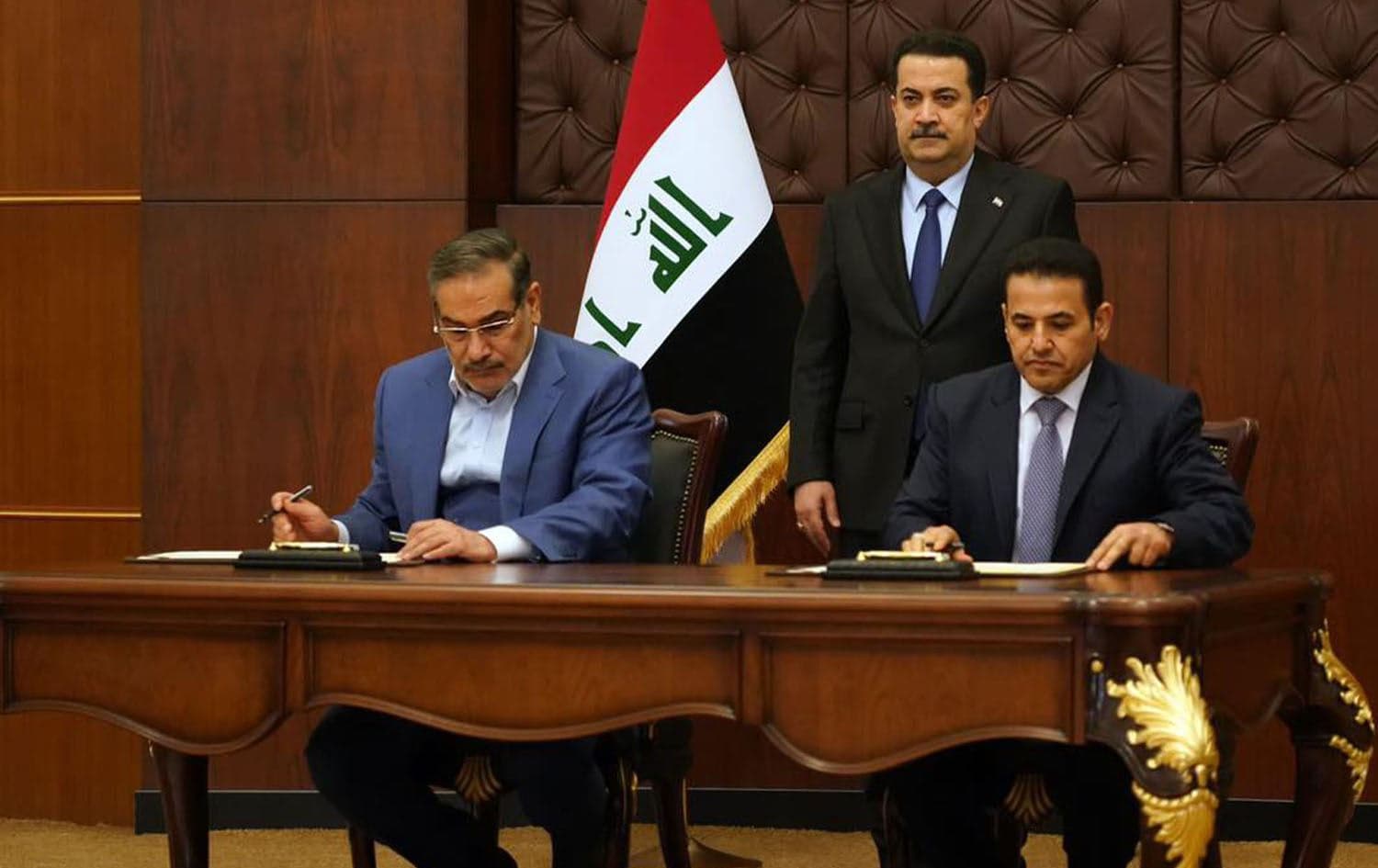 From left: Iran's secretary of the Supreme National Security Council Ali Shamkhani, Iraqi PM Mohammed Shia' al-Sudani (middle), and Iraq's National Security Advisor Qasim al-Araji in Baghdad on March 19, 2023. Photo: Sudani's office 