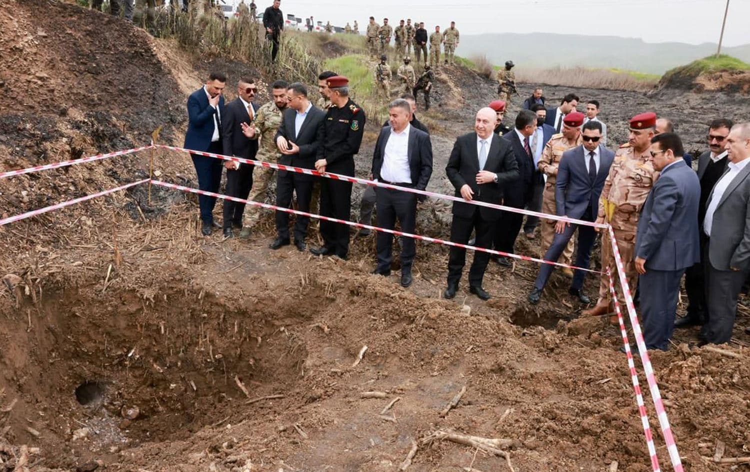 An Iraqi security delegation visiting the site of Sulaimani's drone attack on April 8, 2023. Photo: Qasim al-Araji/Facebook
