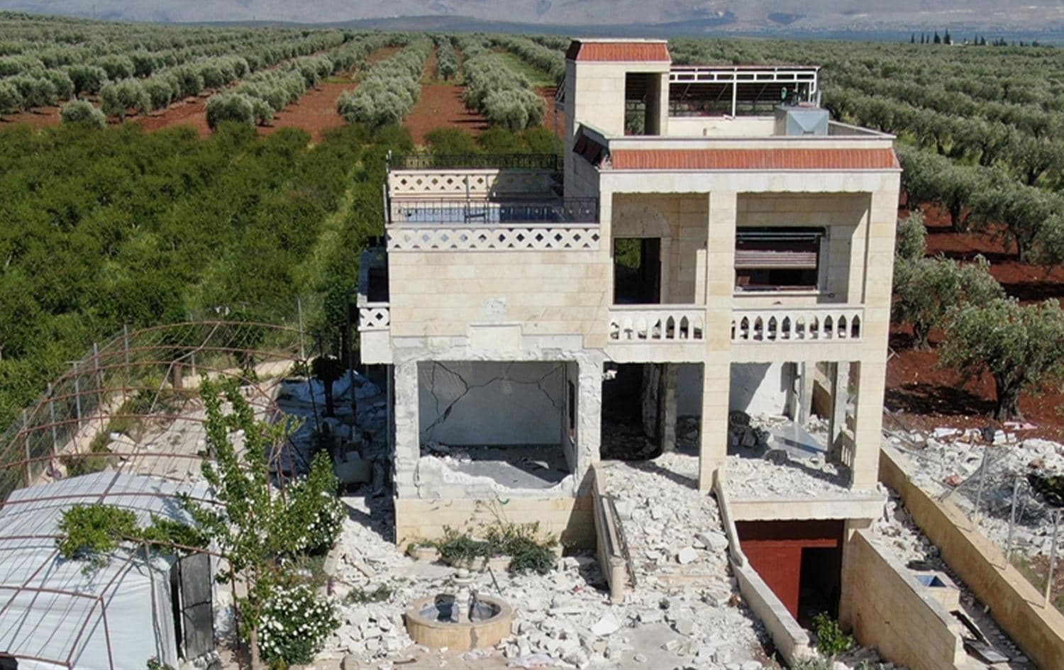 The farmhouse which ISIS chief Abu Hussein al-Qurayshi was using as a hideout near the town of Jindires, northwest Syria on May 1, 2023. Photo: AA