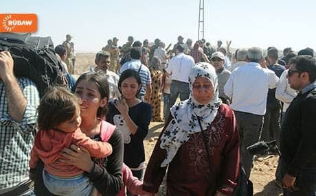 Reluctant to leave Kobane, thousands of Syrian refugees arrive in the Kurdistan Region.