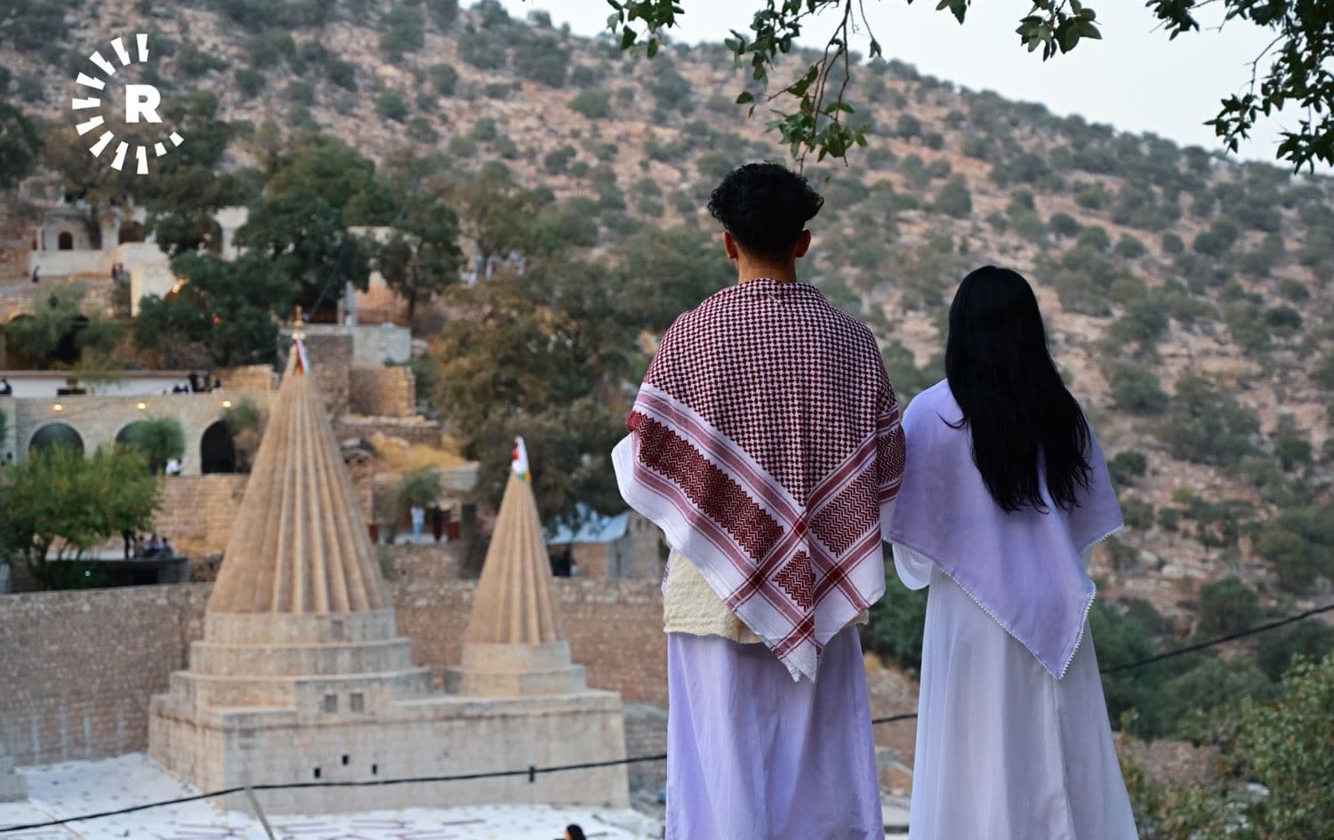 A man and woman during Jama holiday celebrations at the Yazidi holy Temple of Lalish on July 10, 2022. Photo: Bilind T. Abdullah/Rudaw