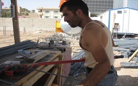 A worker at a construction site in the Kurdistan Region. Photo: Tizian Projects