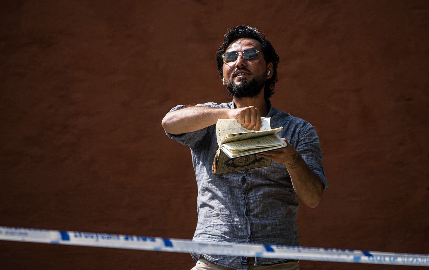 Salwan Momika protests outside a mosque in Stockholm on June 28, 2023, during the Eid al-Adha holiday. Photo: Jonathan Nackstrand/AFP