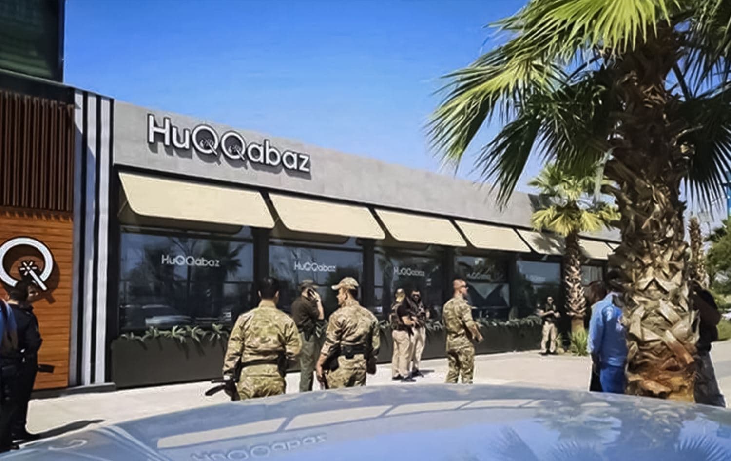 Kurdistan Region's police standing in front of the restaurant where Turkish official Osman Kose was killed in 2019. Photo: Rudaw