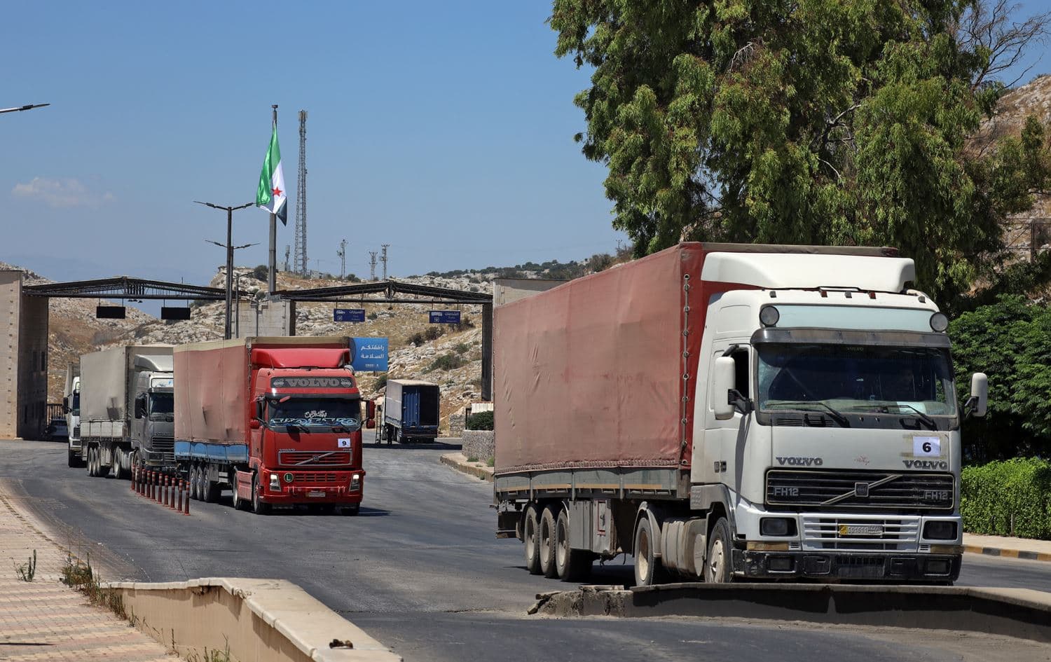 UN aid convoy enters Syria through the Bab al-Hawa border crossing with Turkey on July 28, 2022. Photo: Ahmad al-Atrash/AFP