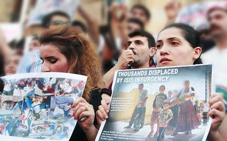 Yezidis in Georgia protesting ISIS attacks on Shingal at a demonstration in August. Photo: Teimuraz Shamoian