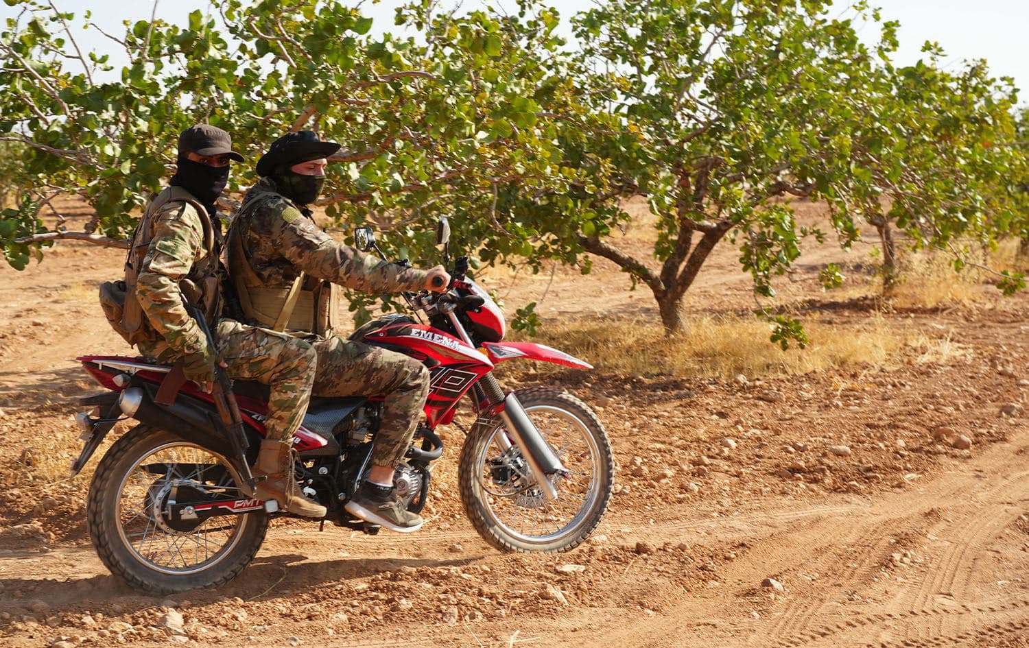 Syrian Arab fighters are positioned on the Mahsali and Arab Hasan frontline, on the Turkish-held outskirts of Manbij in northeastern Syria, as they fight with the Kurdish-led Syrian Democratic Forces (SDF) on September 4, 2023. Photo: Rami al Sayed/AFP